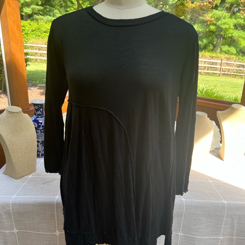 Comfy black long sleeve top. Light weight and perfect Marked XS but FIts LARGE